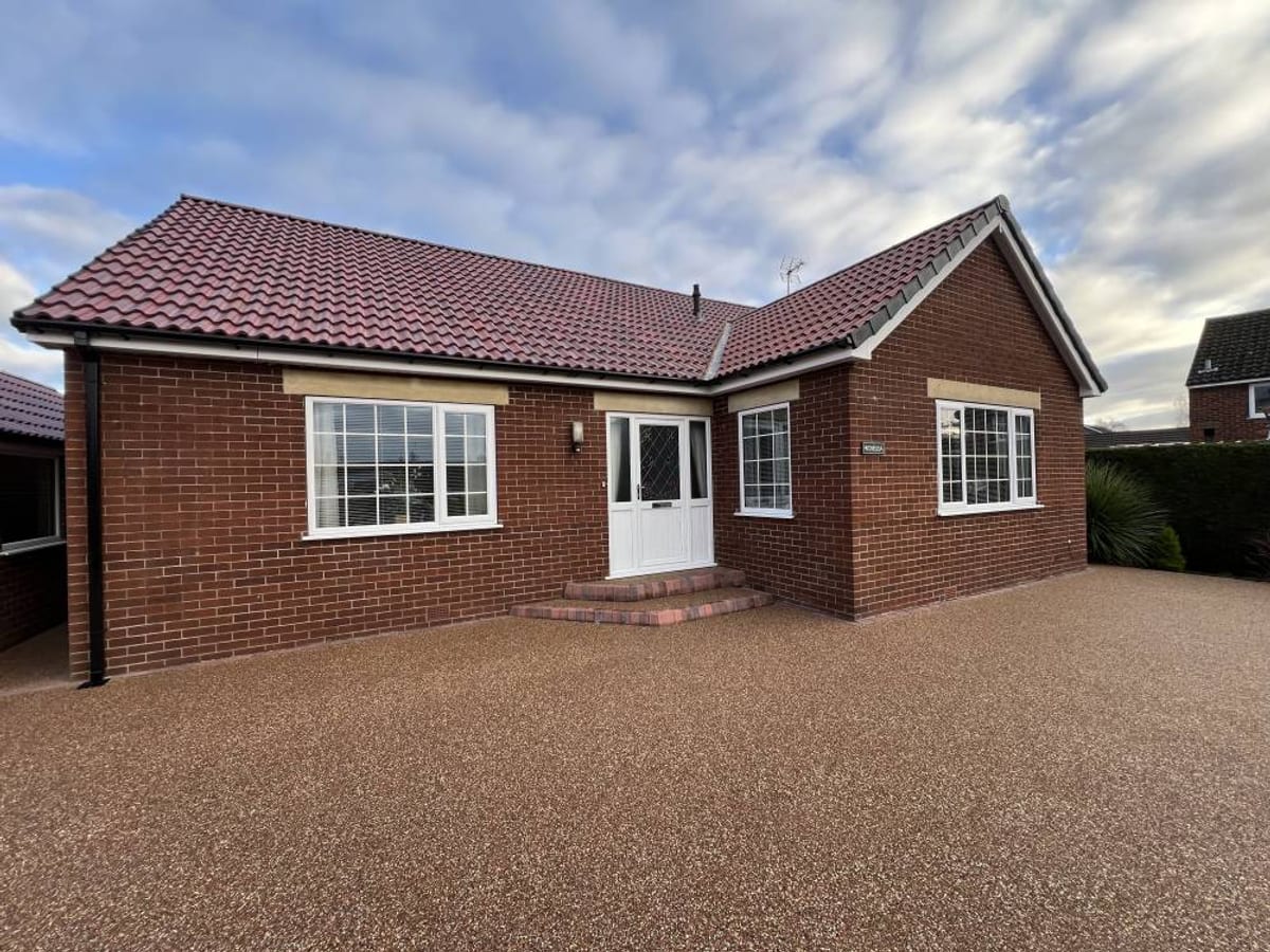 Bungalow with a newly tiled roof and finished driveway