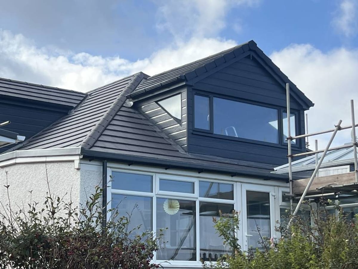 Modern dormer and re-roof on a detached house